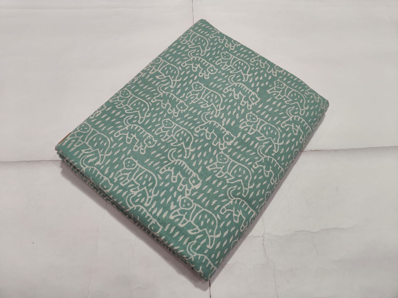 Mint Green Animal Printed Cotton Fabric Unique Design | Maharani Vastra